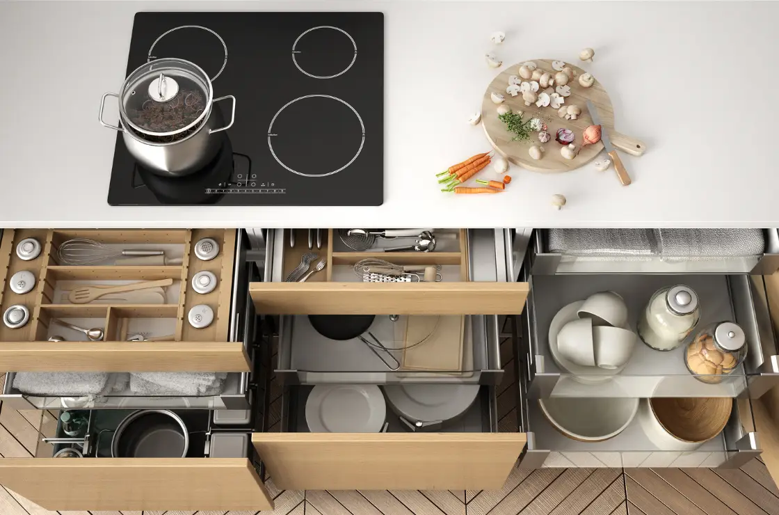 kitchen storage solution - birds eye view of kitchen drawers pulled out to show organized contents